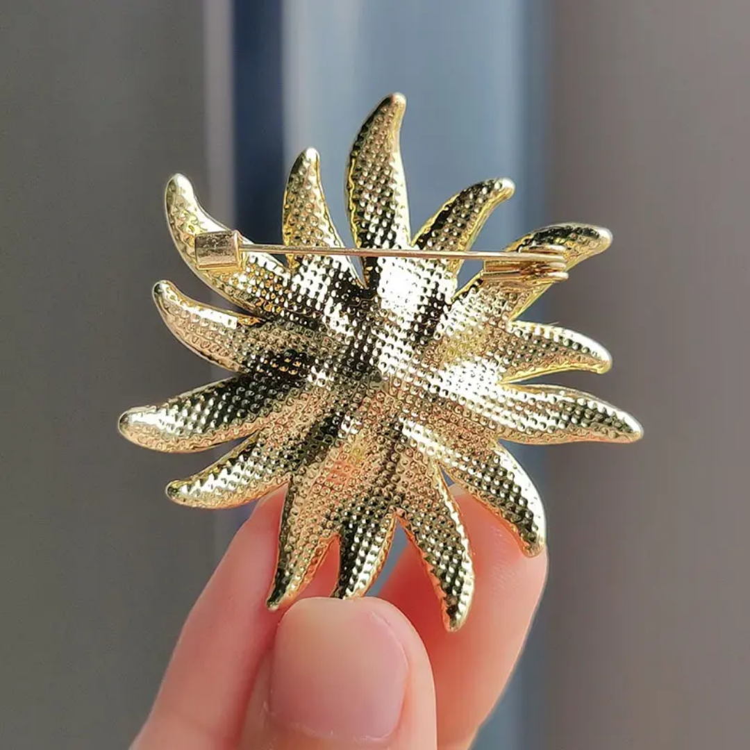 Noble Temperament brooches.